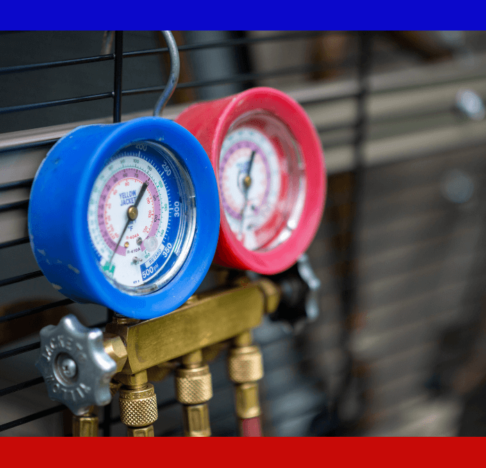 Closeup of 2-valve testing manifolds on an HVAC system.