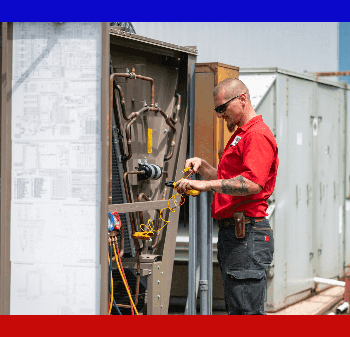 HVAC Master technician maintaining a commercial HVAC unit.