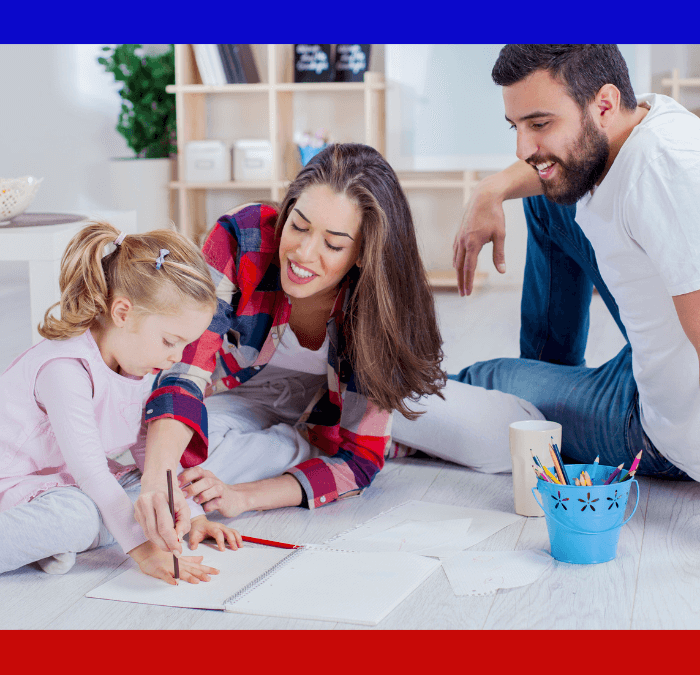 Family coloring together in clean home with purified air