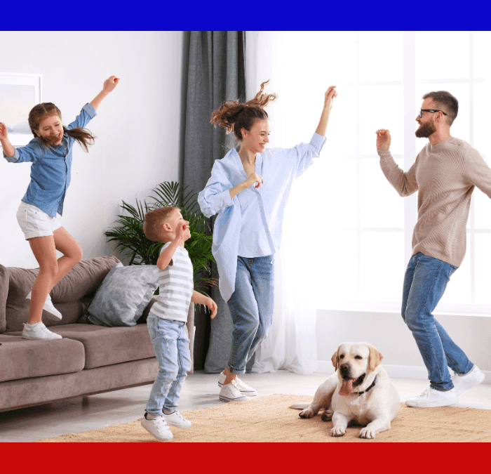 Family having a dance party in clean home with purified air.